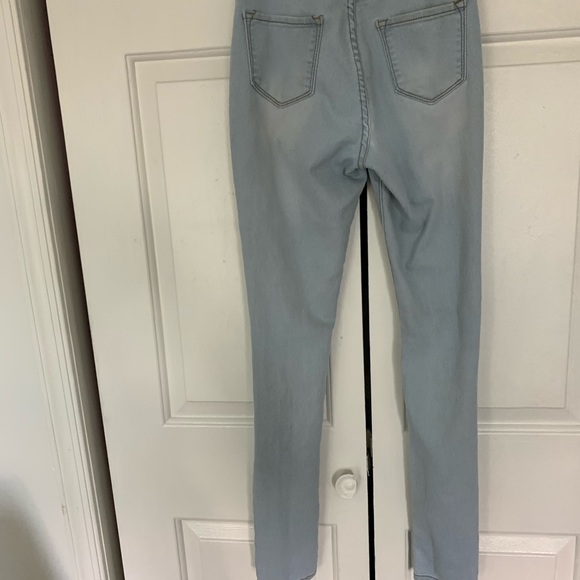 Light Wash Distressed Fashion Nova Jeans - Picture 7 of 16